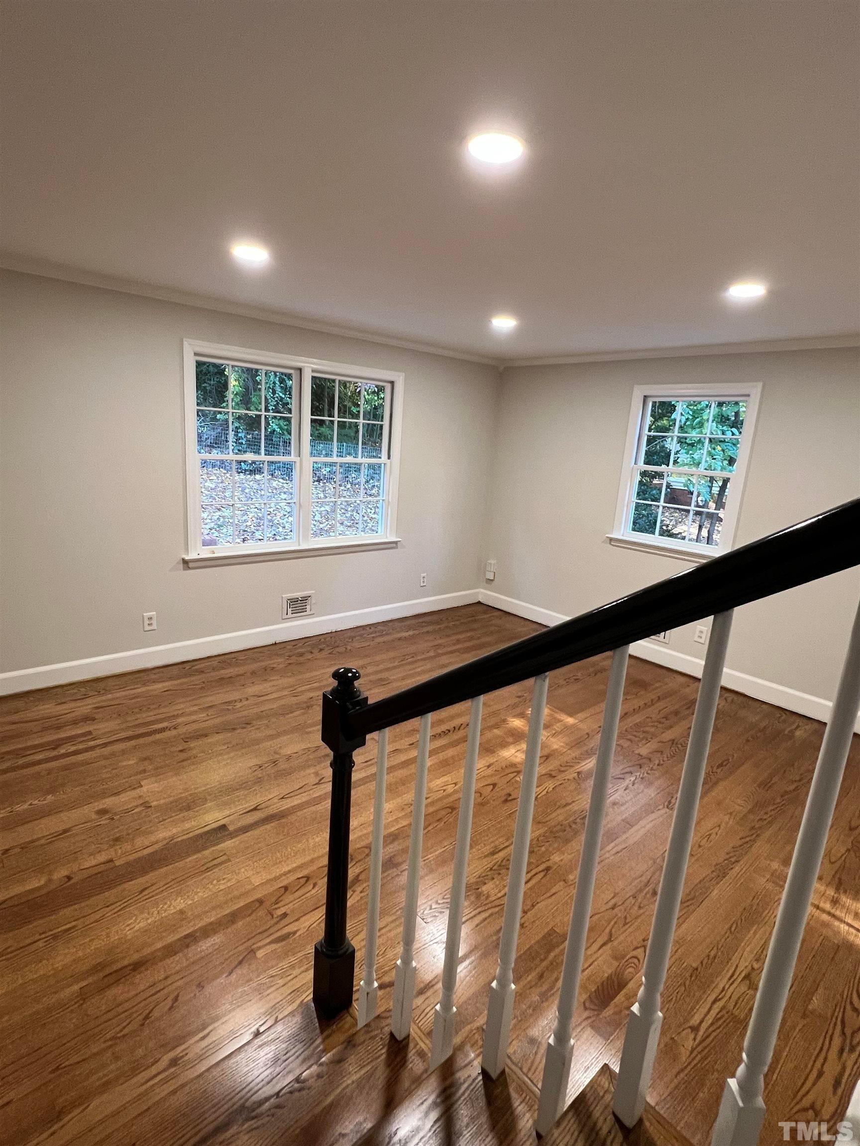 913 Brookwood Drive Raleigh, NC 27607 - Photo 17 of 26 a view of an entryway with wooden floor