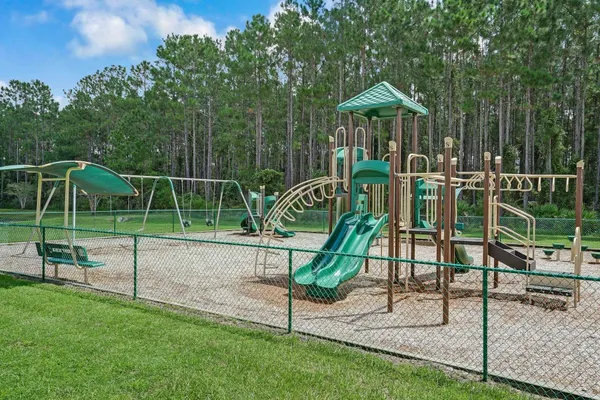 a view of a sitting area with a big yard