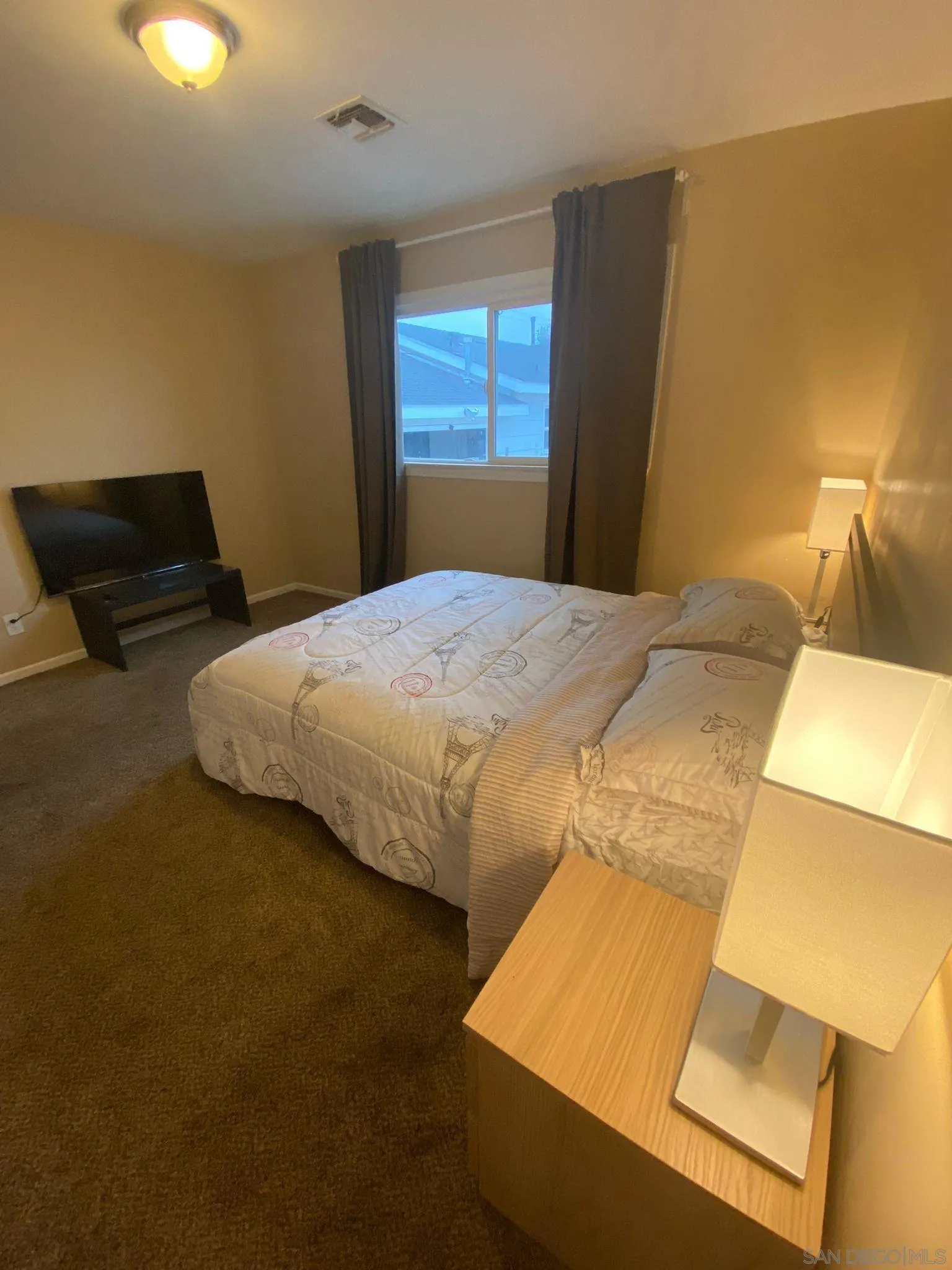 5442 San Onofre Terrace San Diego, CA 92114 - Photo 15 of 29 a bedroom with a bed and wooden floor