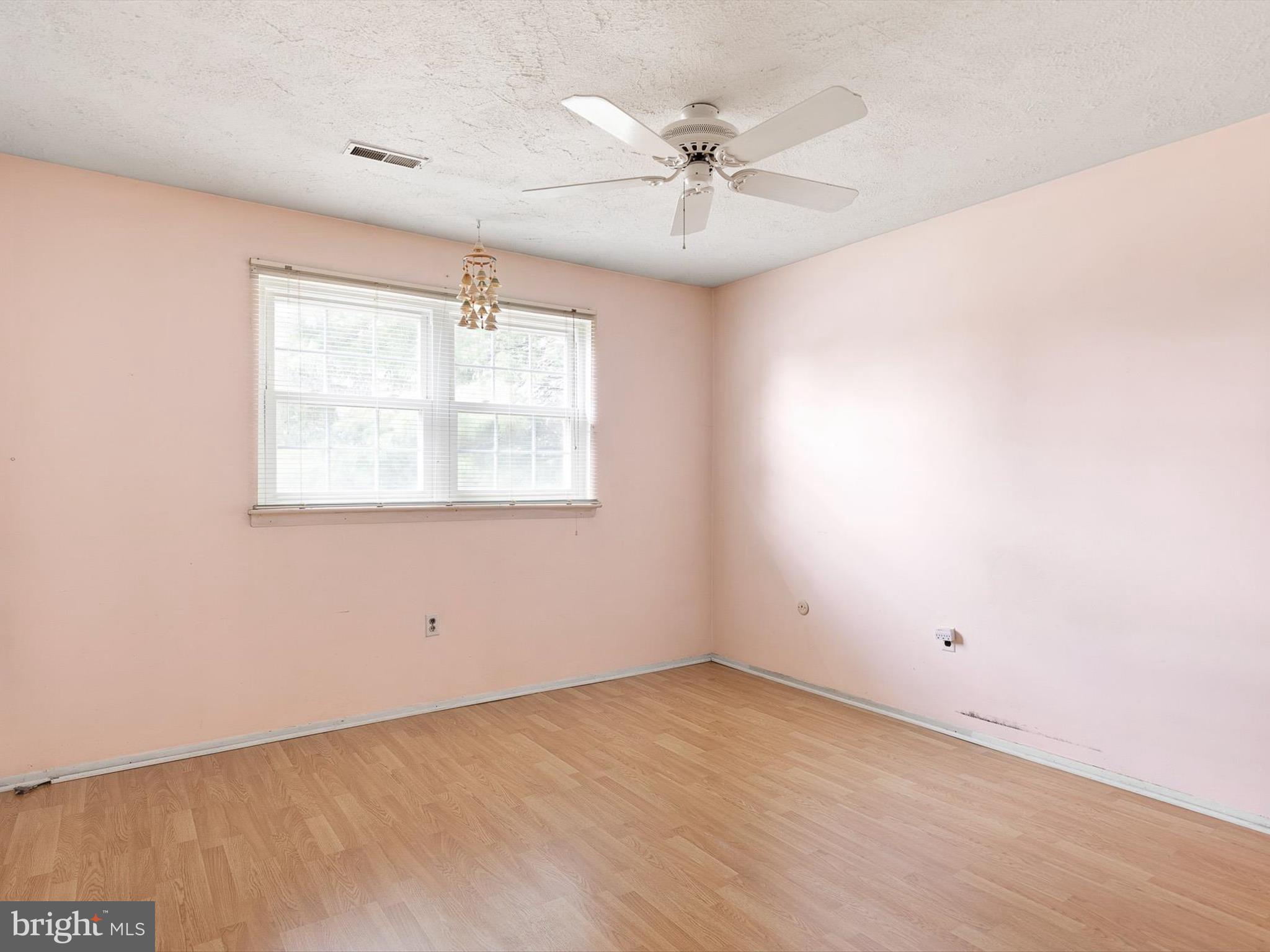 5 Topaz Drive Newark, DE 19702 - Photo 14 of 28 an empty room with a window and a fan