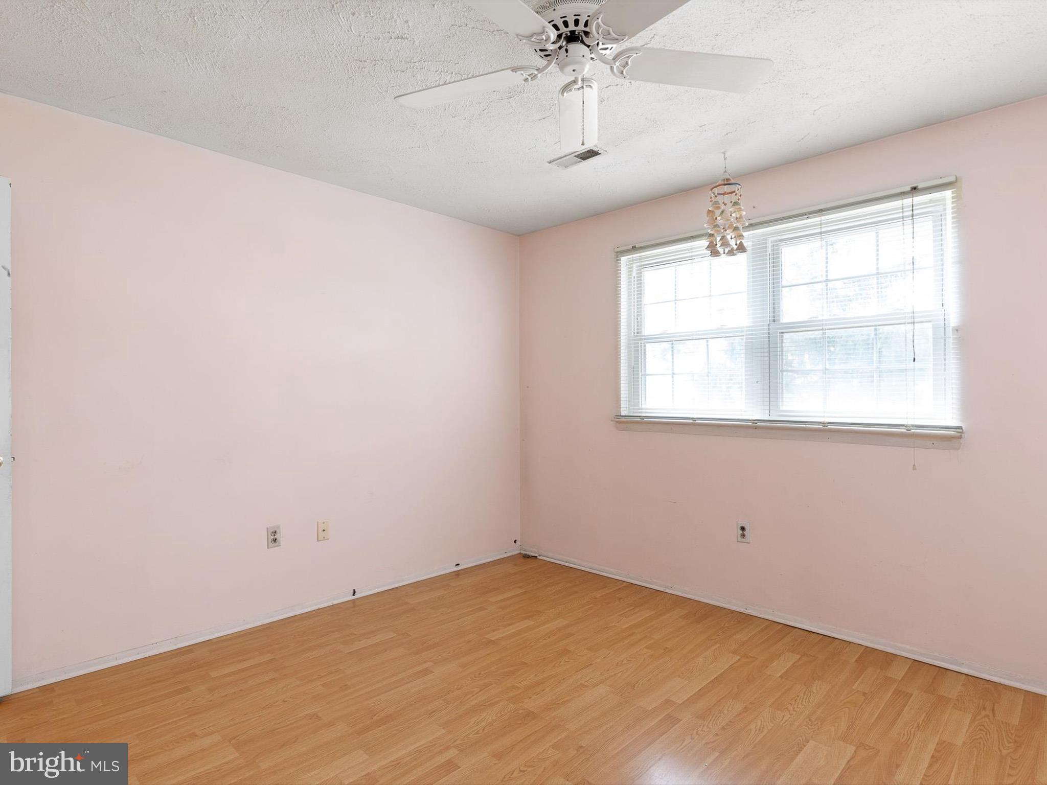 5 Topaz Drive Newark, DE 19702 - Photo 15 of 28 an empty room with windows and fan