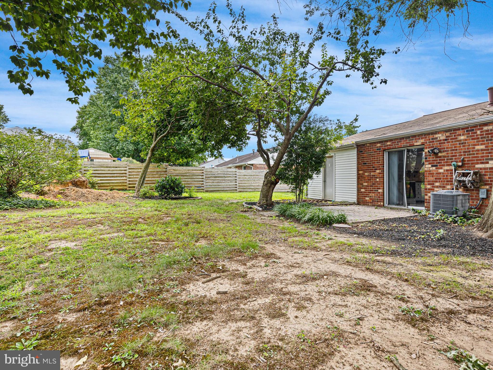 5 Topaz Drive Newark, DE 19702 - Photo 24 of 28 a view of a house with backyard and tree