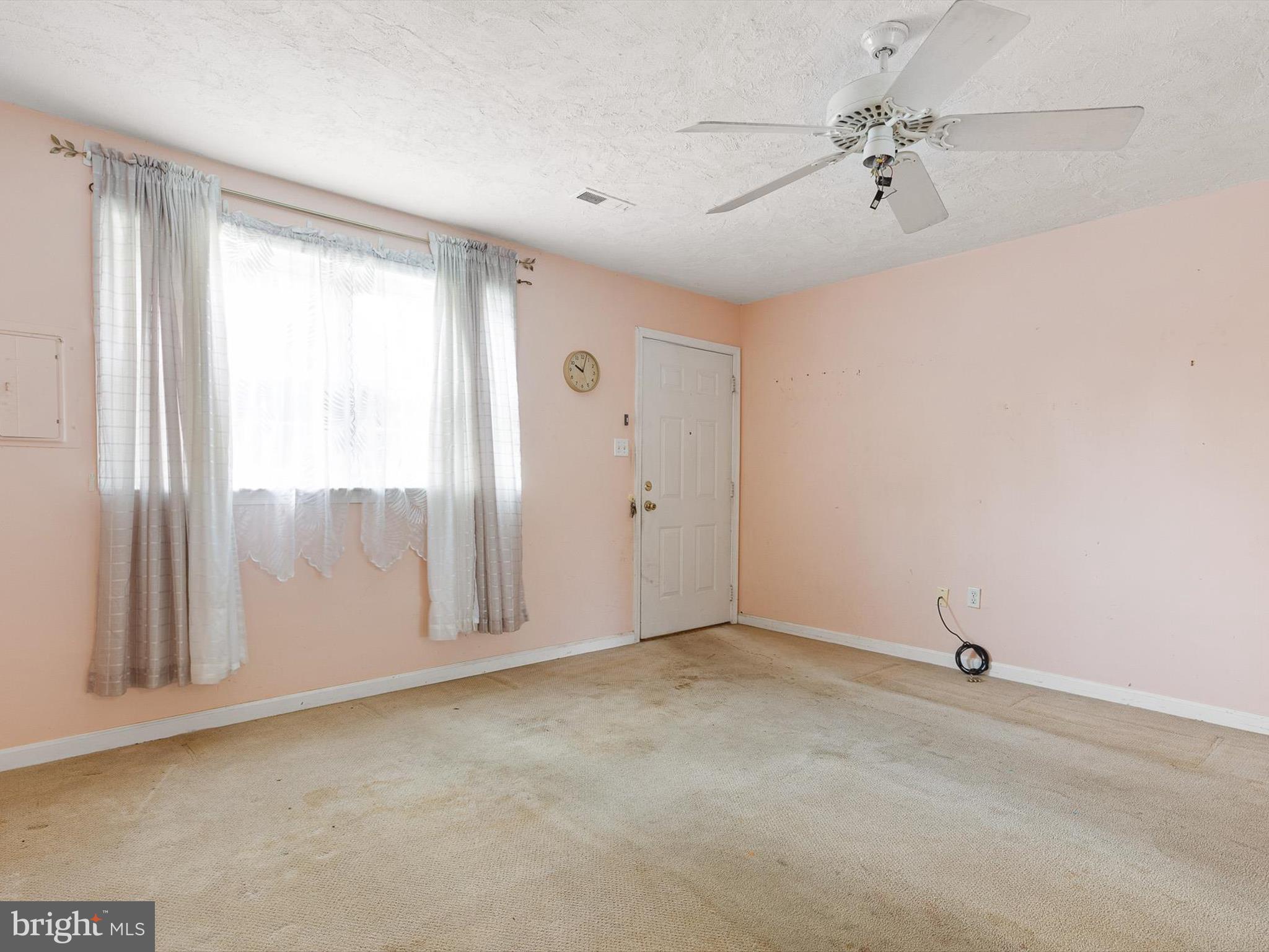 5 Topaz Drive Newark, DE 19702 - Photo 7 of 28 a view of an empty room with a window