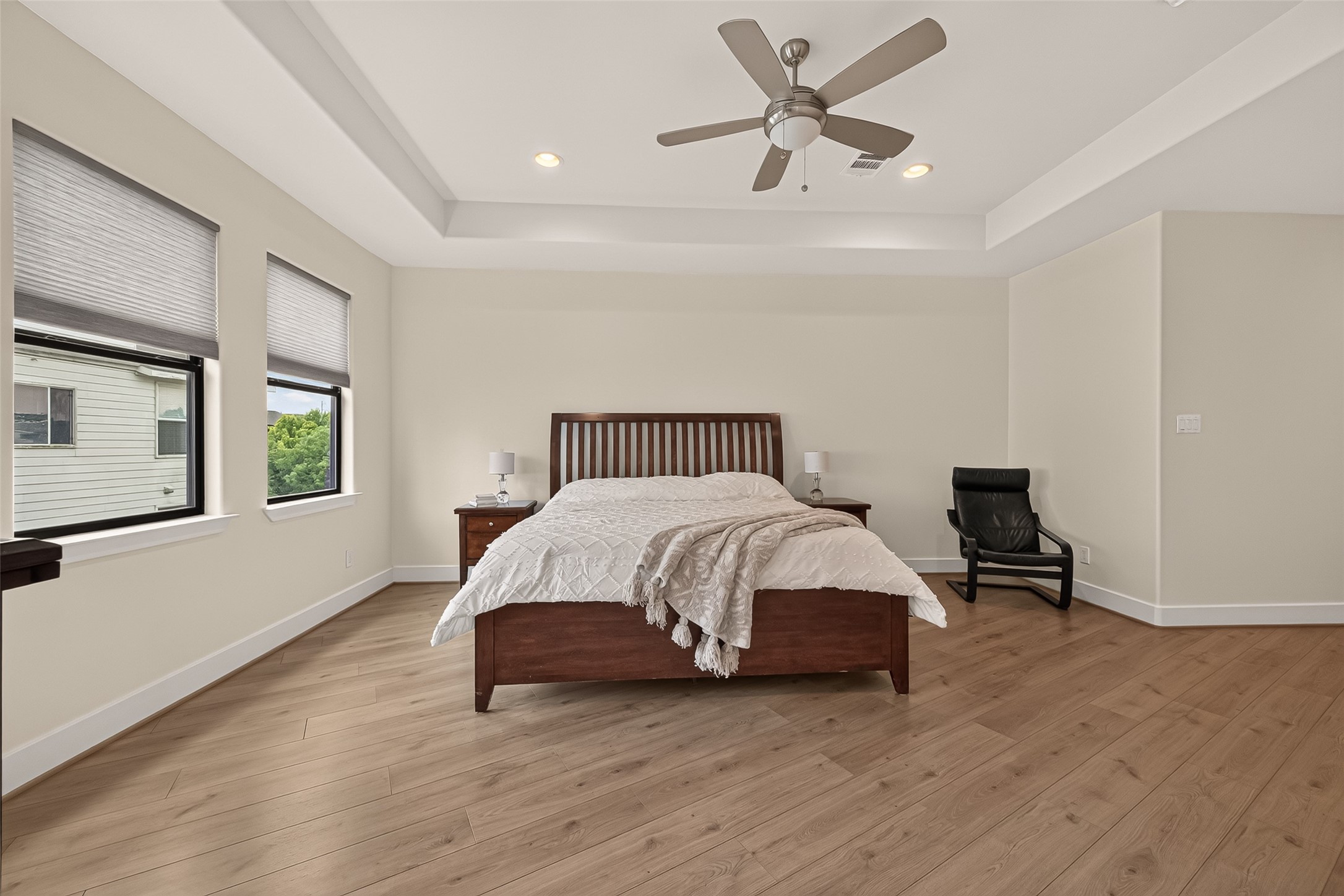 1767 Michigan Street Houston, TX 77006 - Photo 22 of 33 Ample windows in the primary bedroom offer a bright, airy feel.