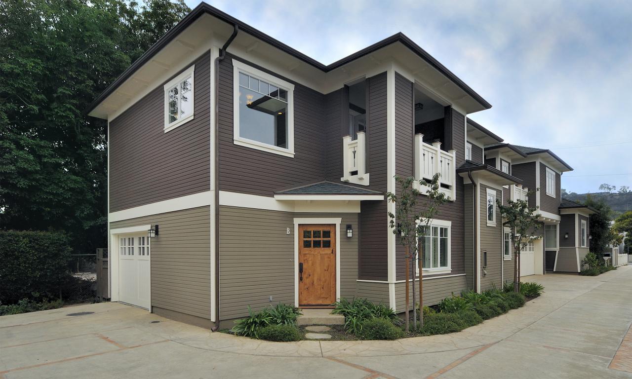 a front view of a house with yard