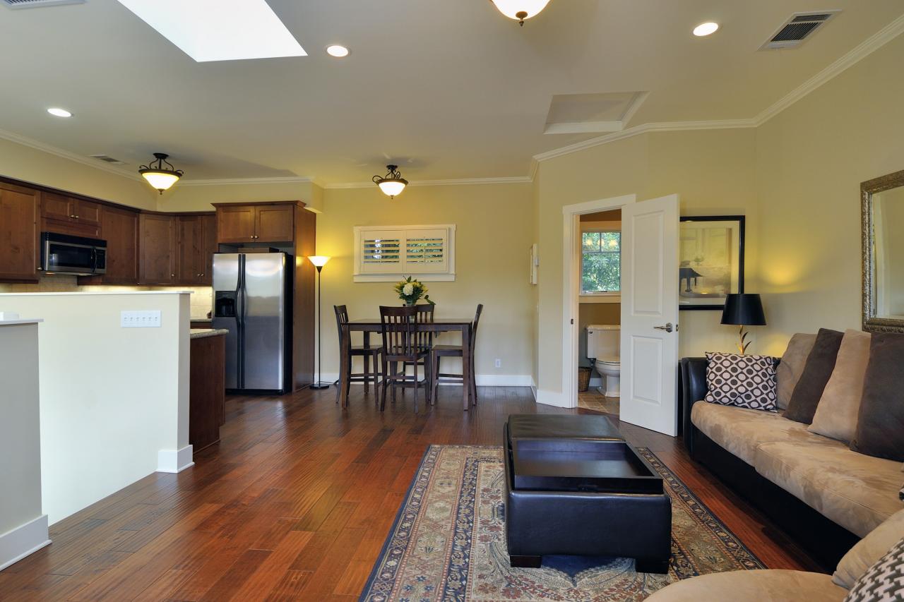 828 Bath Street Santa Barbara, CA 93101 - Photo 2 of 3 a living room with furniture and a dining table with kitchen view