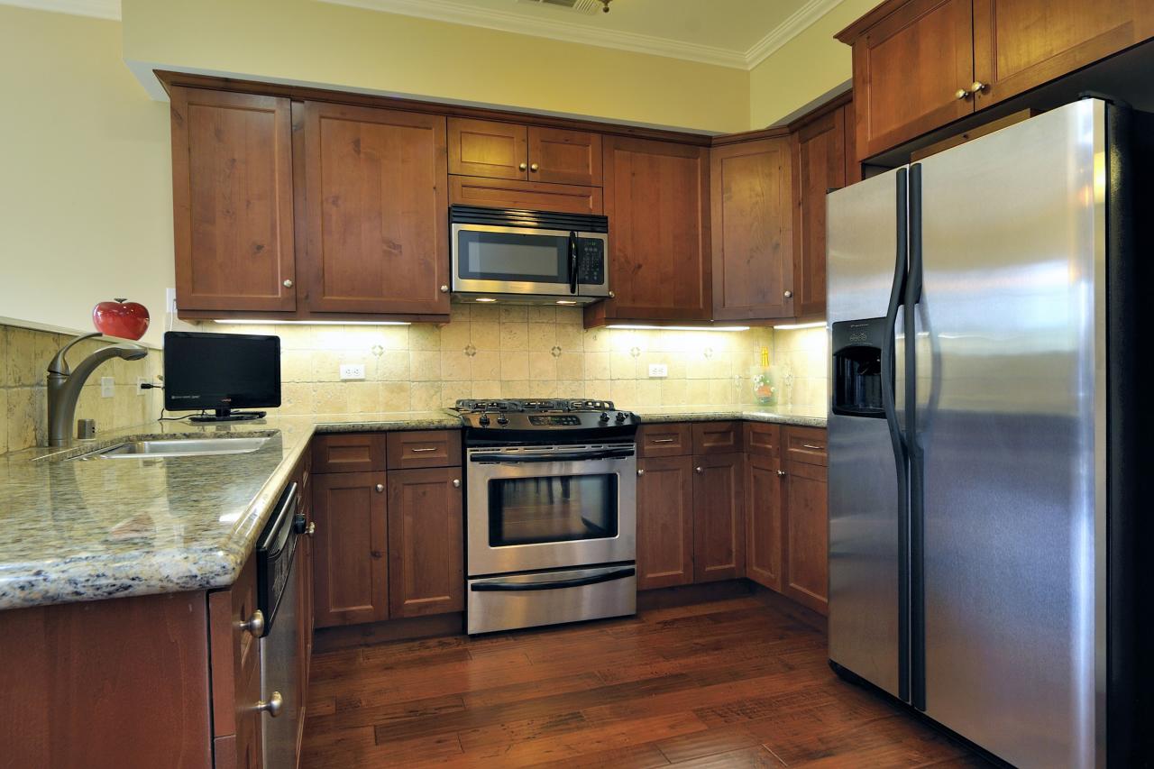 828 Bath Street Santa Barbara, CA 93101 - Photo 3 of 3 a kitchen with a sink stove and refrigerator