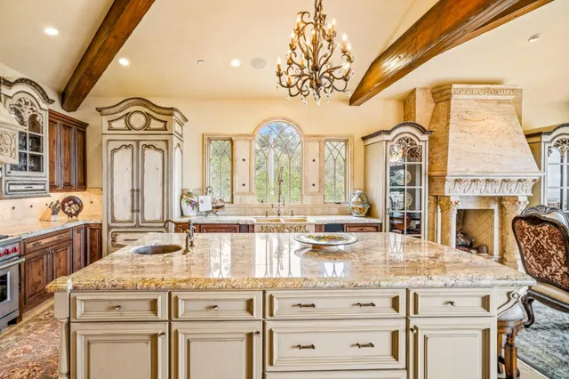 a bed room with a bed and a chair