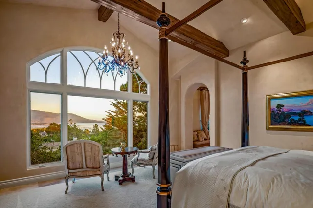 a livingroom with a furniture and natural light