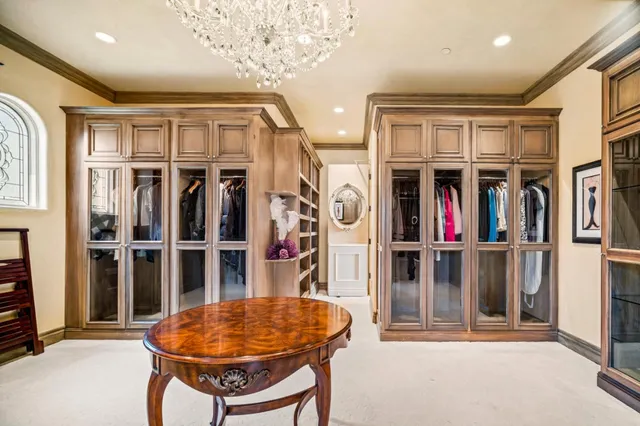 a bedroom with bed and window