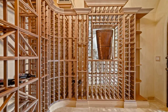 a view of walk in closet with clothes