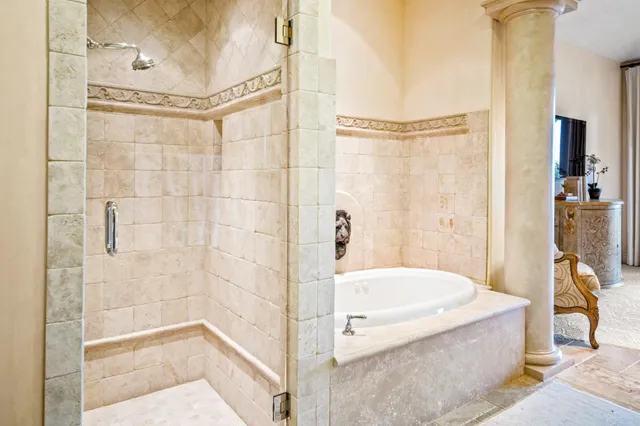 an aerial view of a city and mountain