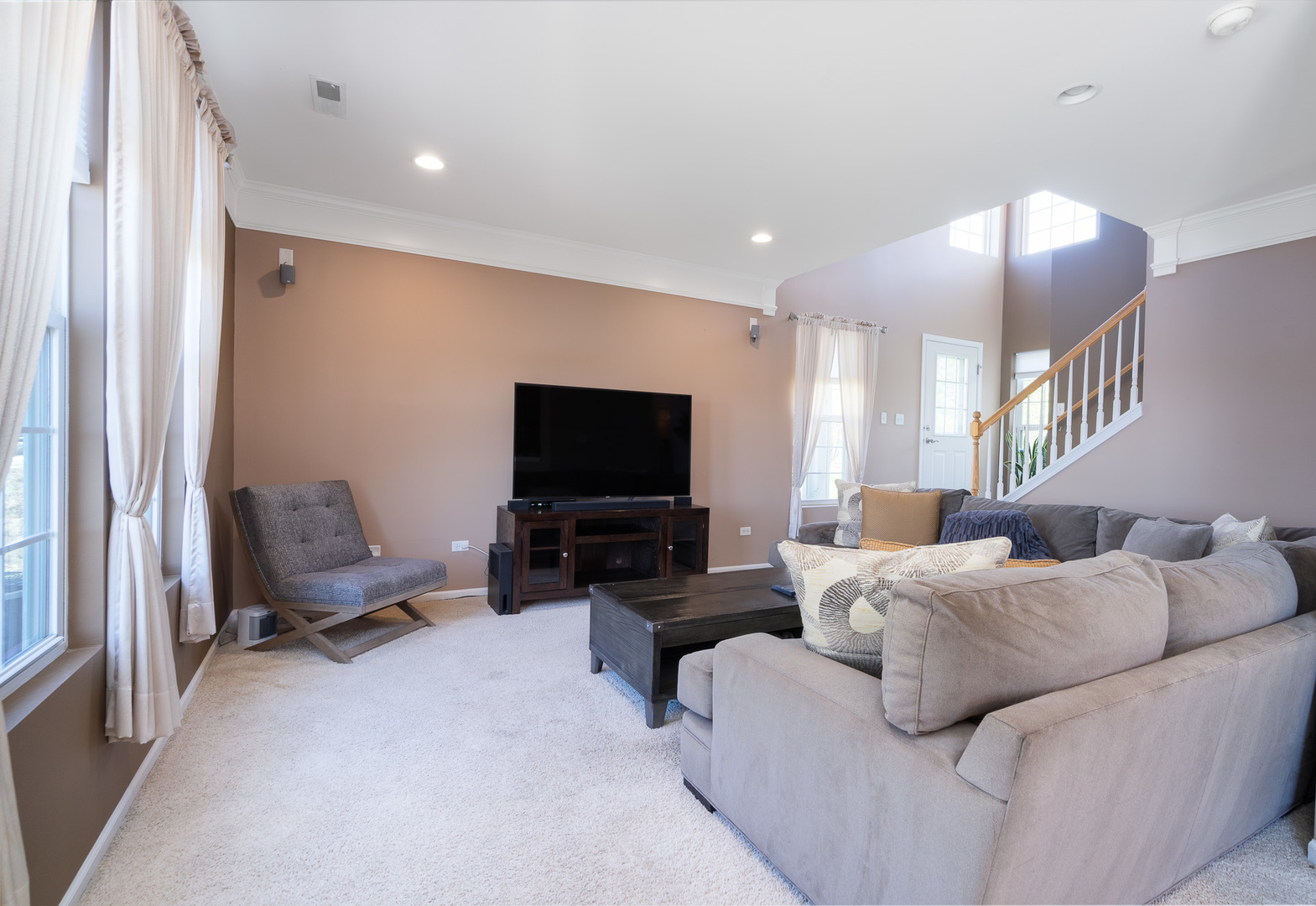 15316 Pinewood Road Lockport, IL 60441 - Photo 13 of 31 a living room with furniture and a flat screen tv