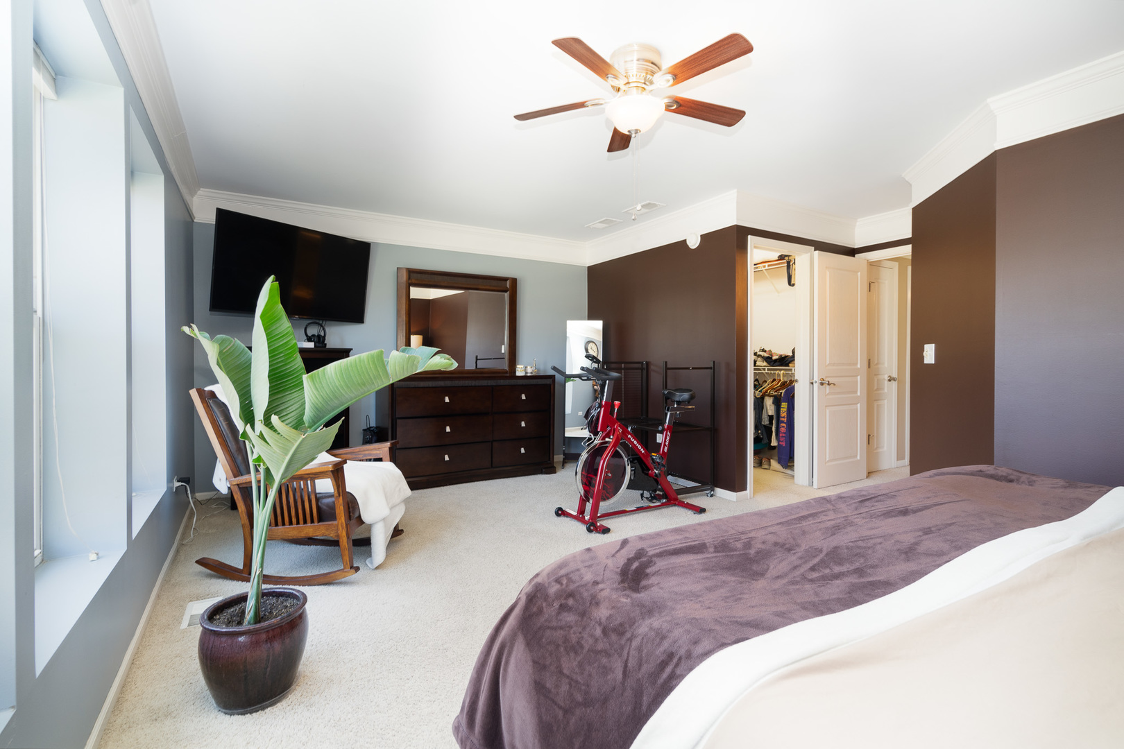 15316 Pinewood Road Lockport, IL 60441 - Photo 18 of 31 a bedroom with a bed gym equipment and view of living room