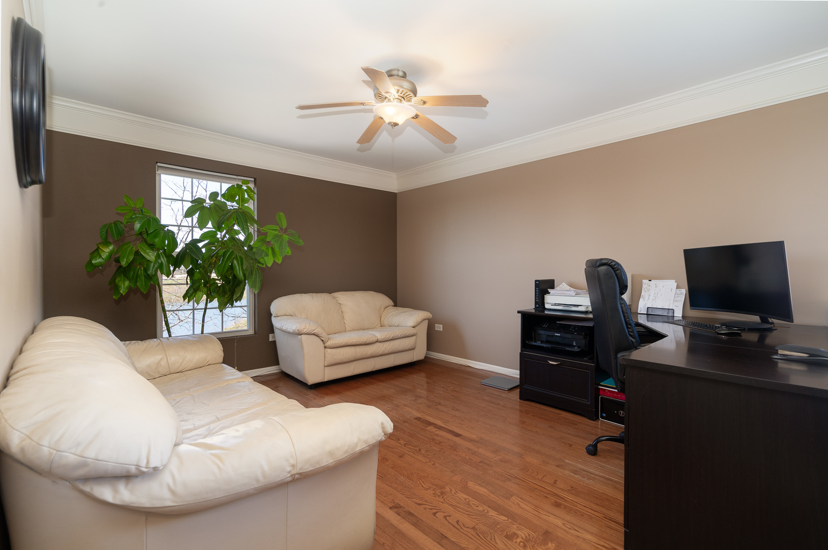 15316 Pinewood Road Lockport, IL 60441 - Photo 21 of 31 a living room with furniture and a potted plant