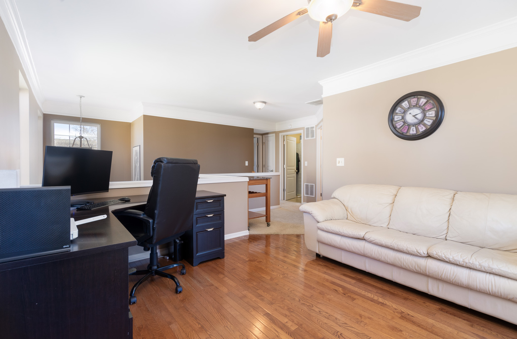15316 Pinewood Road Lockport, IL 60441 - Photo 22 of 31 a view of a livingroom with workspace and a couch
