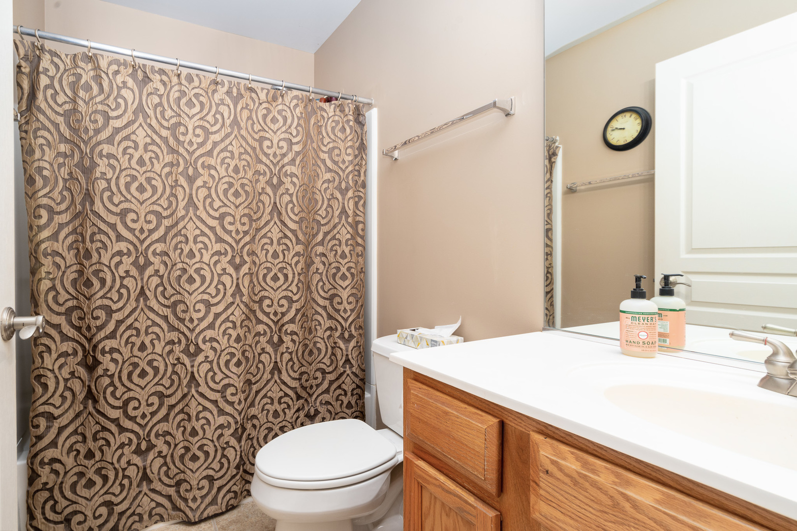 15316 Pinewood Road Lockport, IL 60441 - Photo 23 of 31 a bathroom with a sink a toilet and a mirror