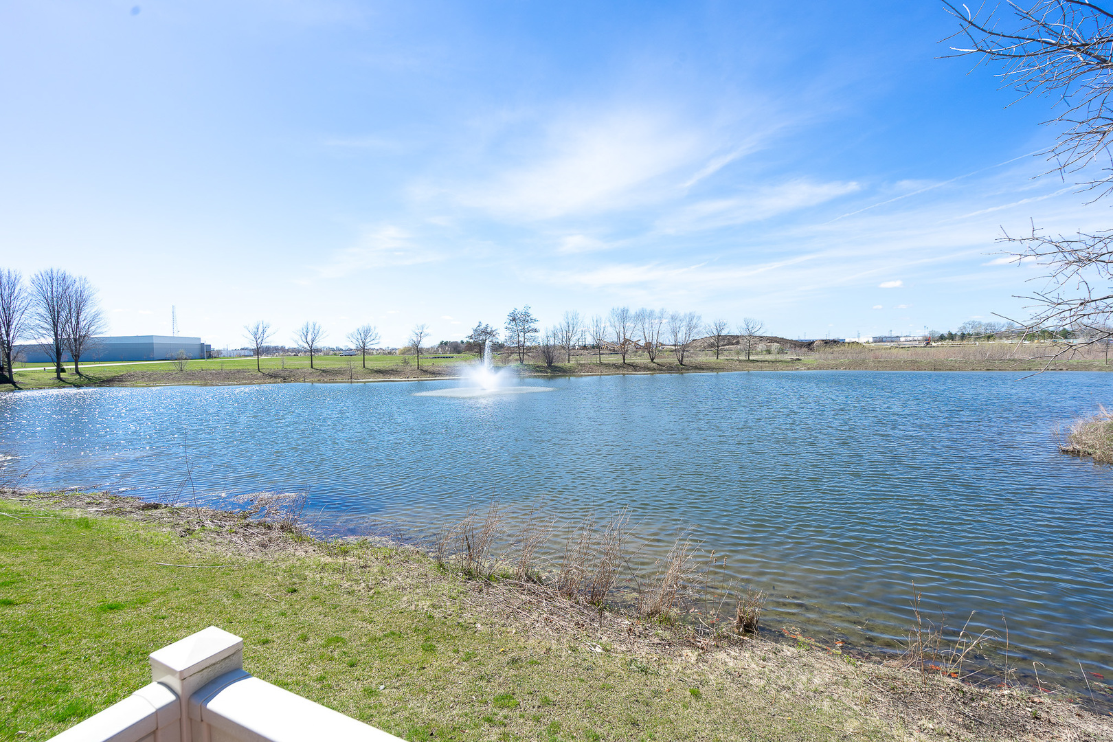 15316 Pinewood Road Lockport, IL 60441 - Photo 6 of 31 a view of a lake with houses in the back