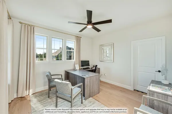 a workspace with furniture and window