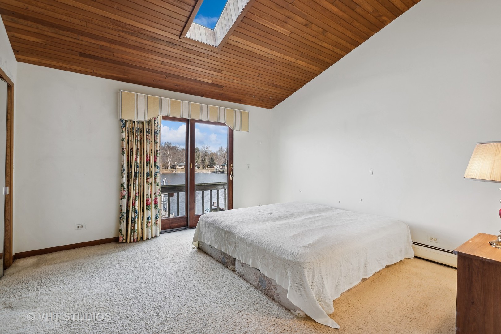 320 North River Road Fox River Grove, IL 60021 - Photo 12 of 32 a spacious bedroom with a bed and a large window