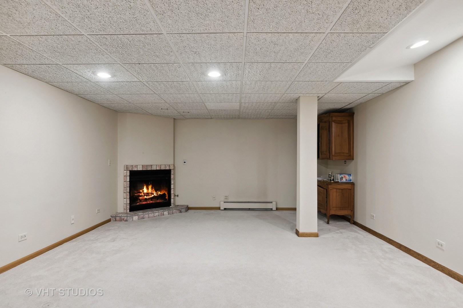 320 North River Road Fox River Grove, IL 60021 - Photo 18 of 32 a view of an empty room with a fireplace