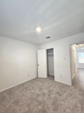 an empty room with an entryway