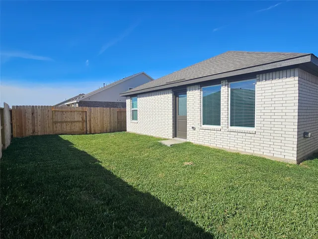 a view of a backyard with a garden