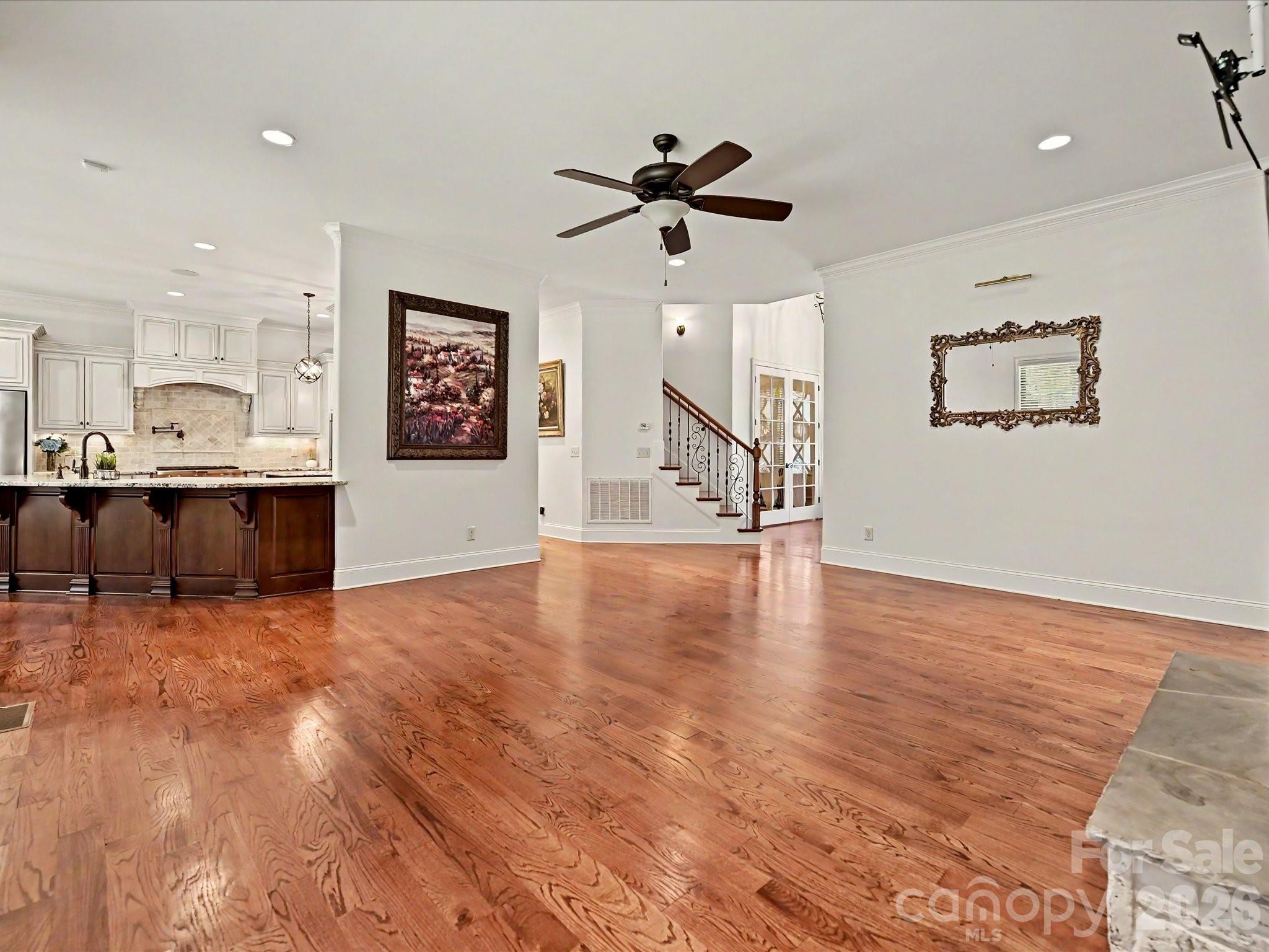 280 Palm Cove Way York, SC 29745 - Photo 17 of 48 a view of empty room with wooden floor and fan