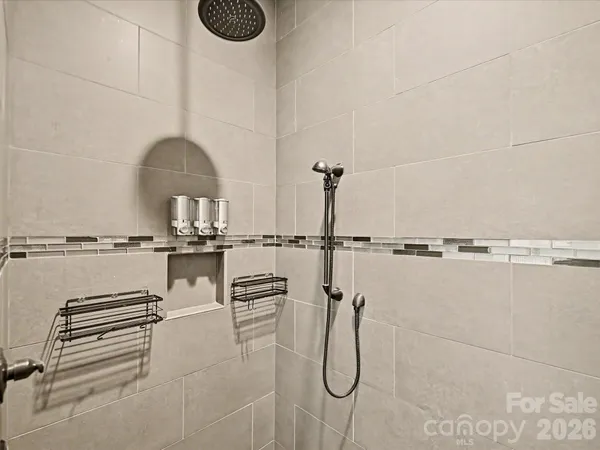a view of a livingroom with a furniture and front door