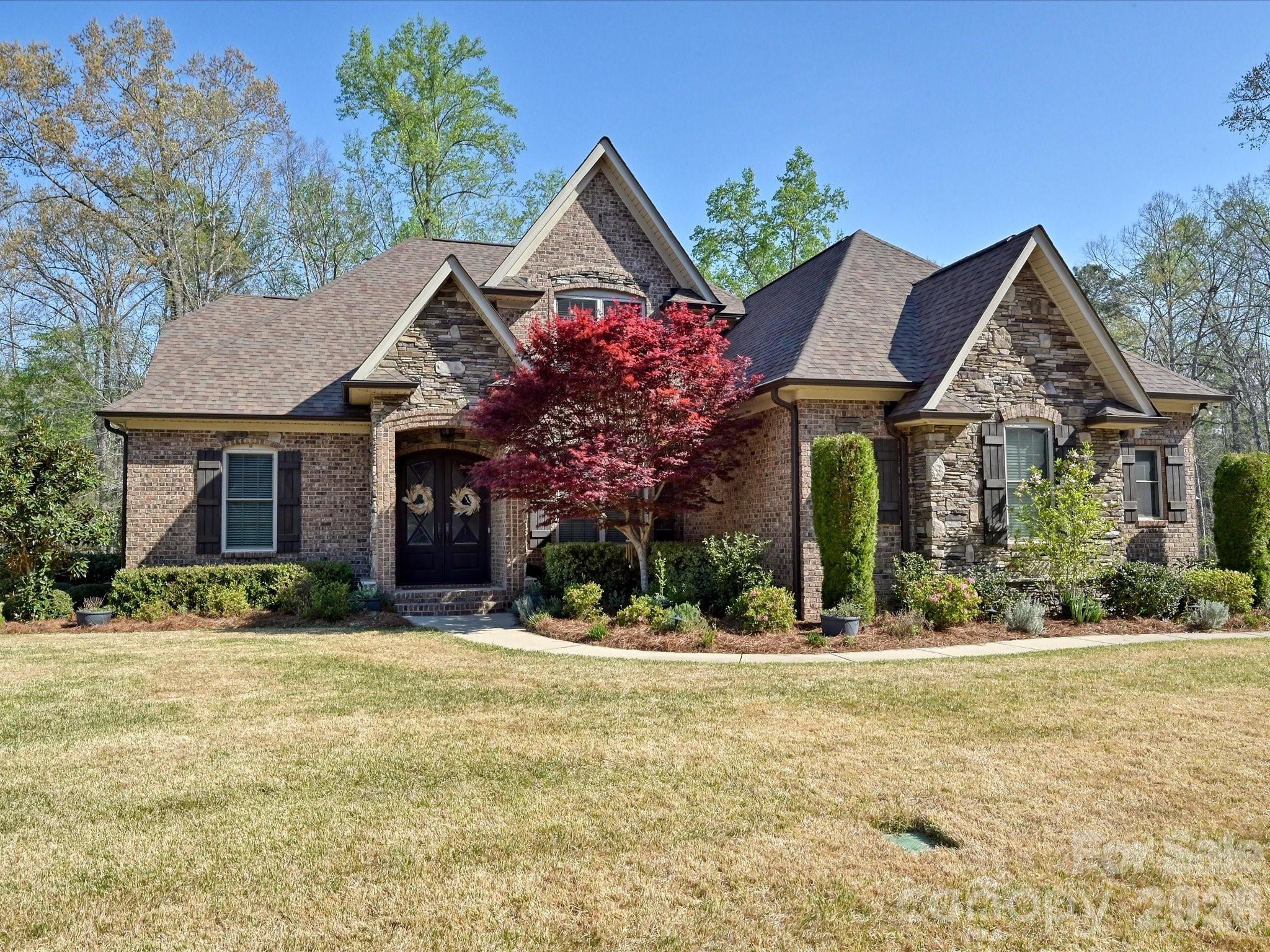 280 Palm Cove Way York, SC 29745 - Photo 3 of 48 a front view of a house with a yard