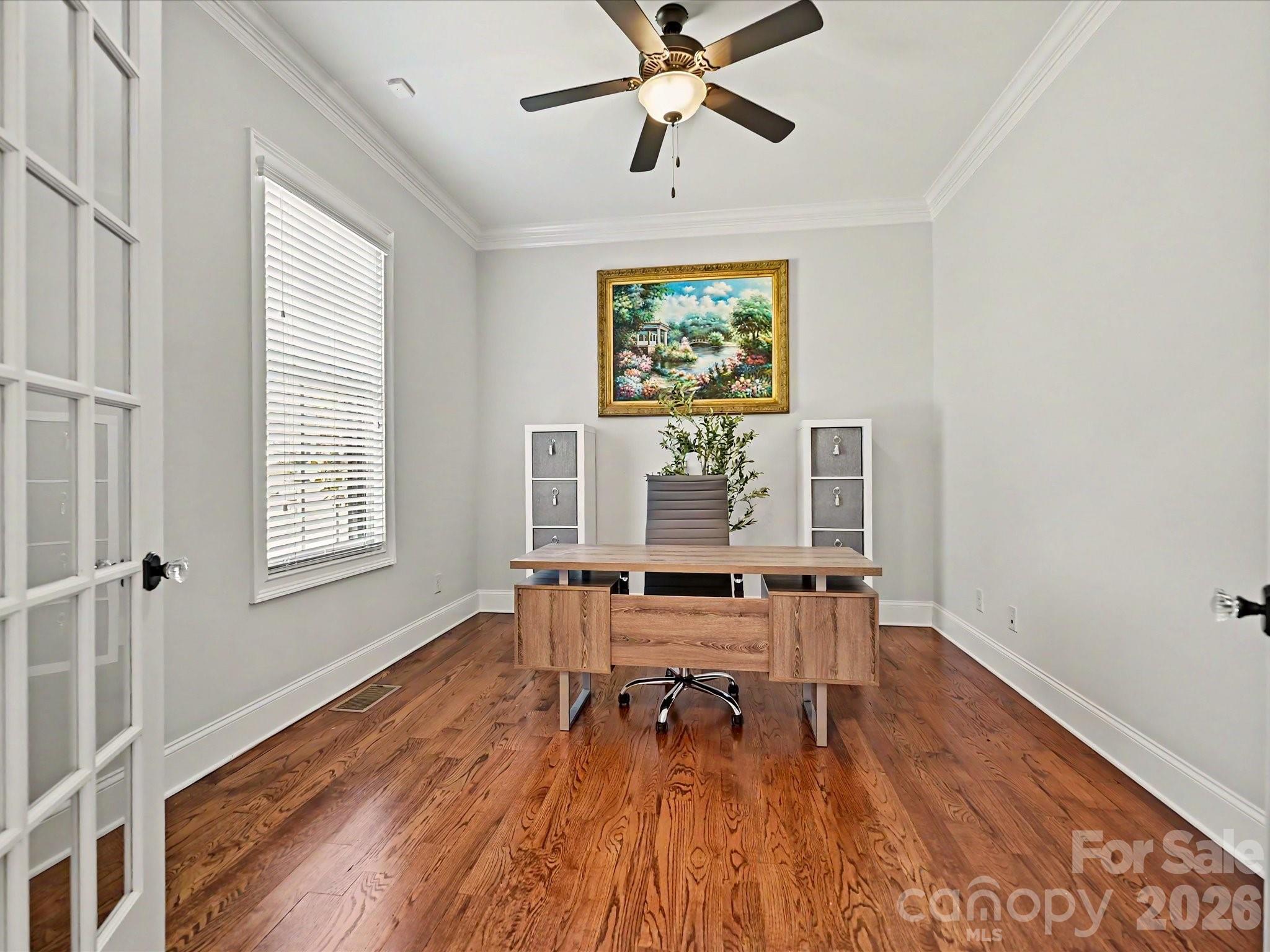280 Palm Cove Way York, SC 29745 - Photo 10 of 48 a workspace with wooden floor and a window