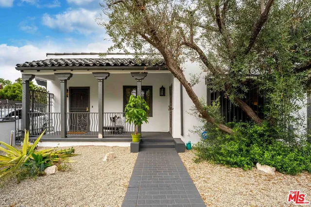 a front view of a house with a porch