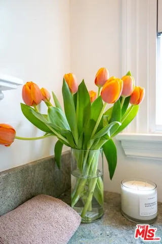 a vase of flowers sitting on a table