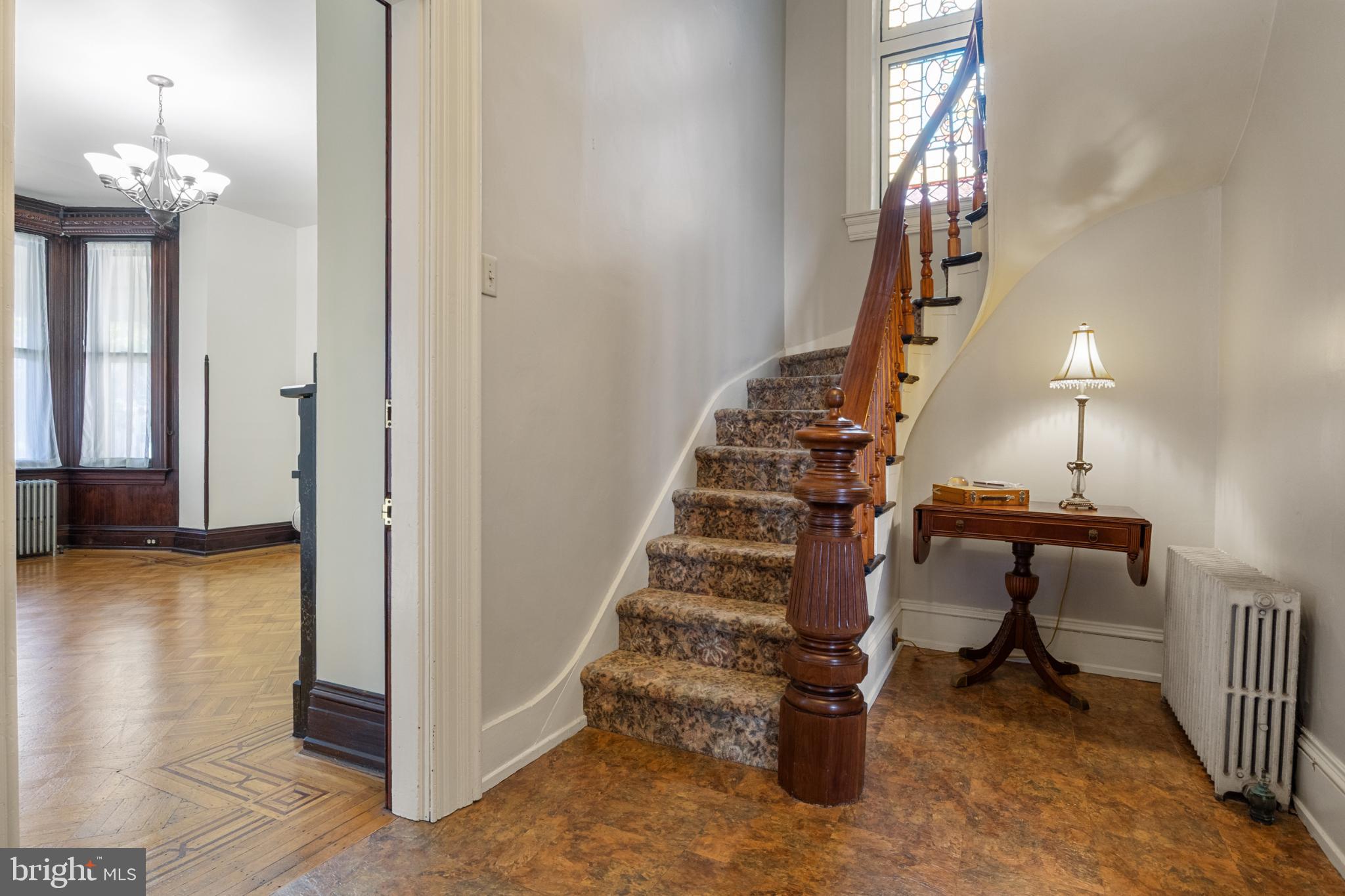 721 South George Street York, PA 17401 - Photo 12 of 78 a view of entryway and hall with wooden floor
