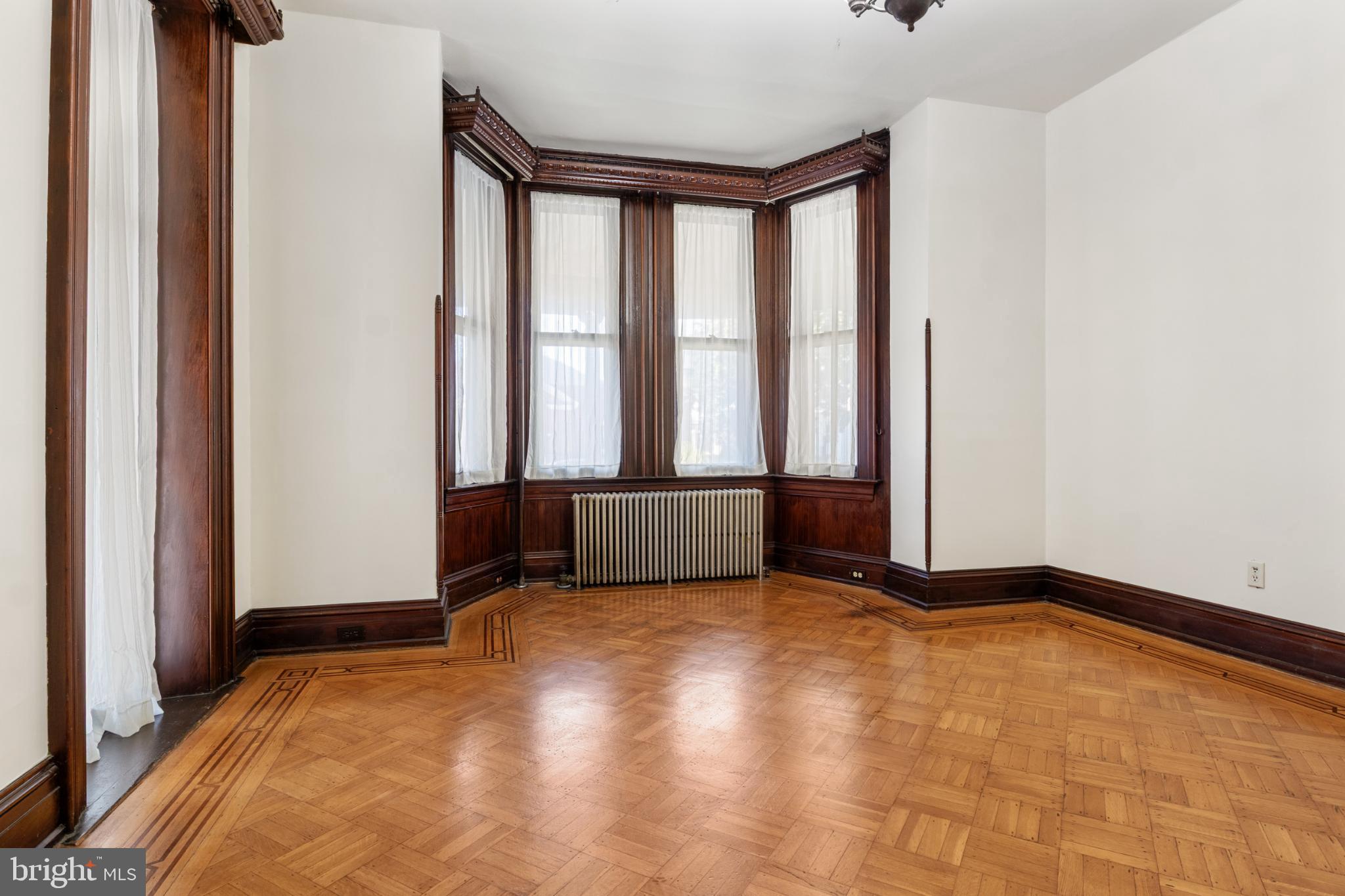 721 South George Street York, PA 17401 - Photo 13 of 78 a view of an empty room with glass door