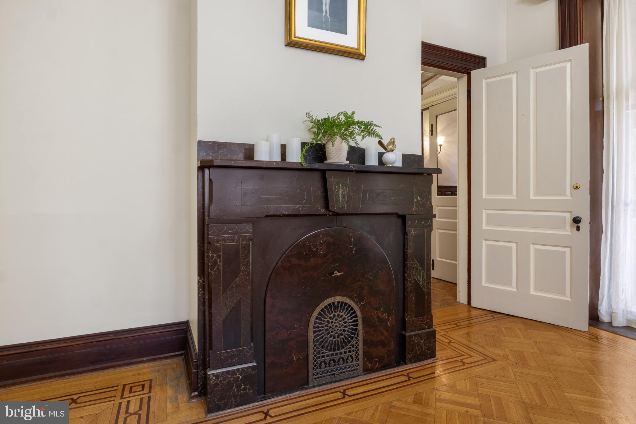 721 South George Street York, PA 17401 - Photo 15 of 78 a living room with furniture and a fireplace