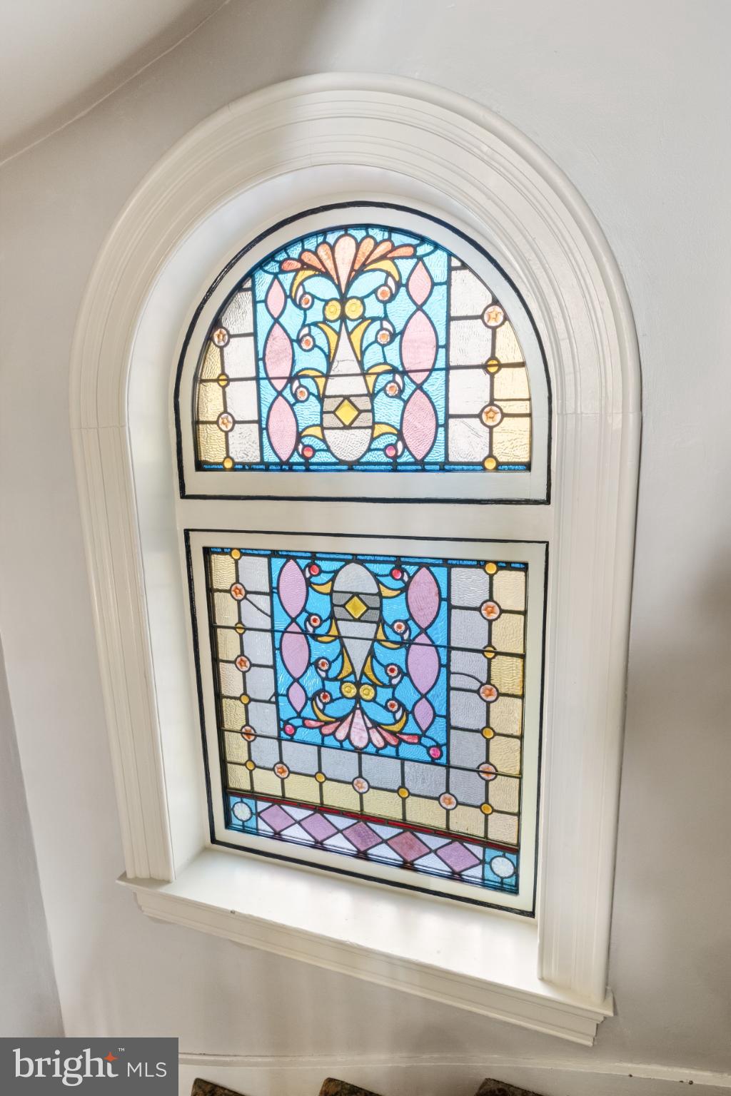721 South George Street York, PA 17401 - Photo 30 of 78 Vibrant stained glass window.