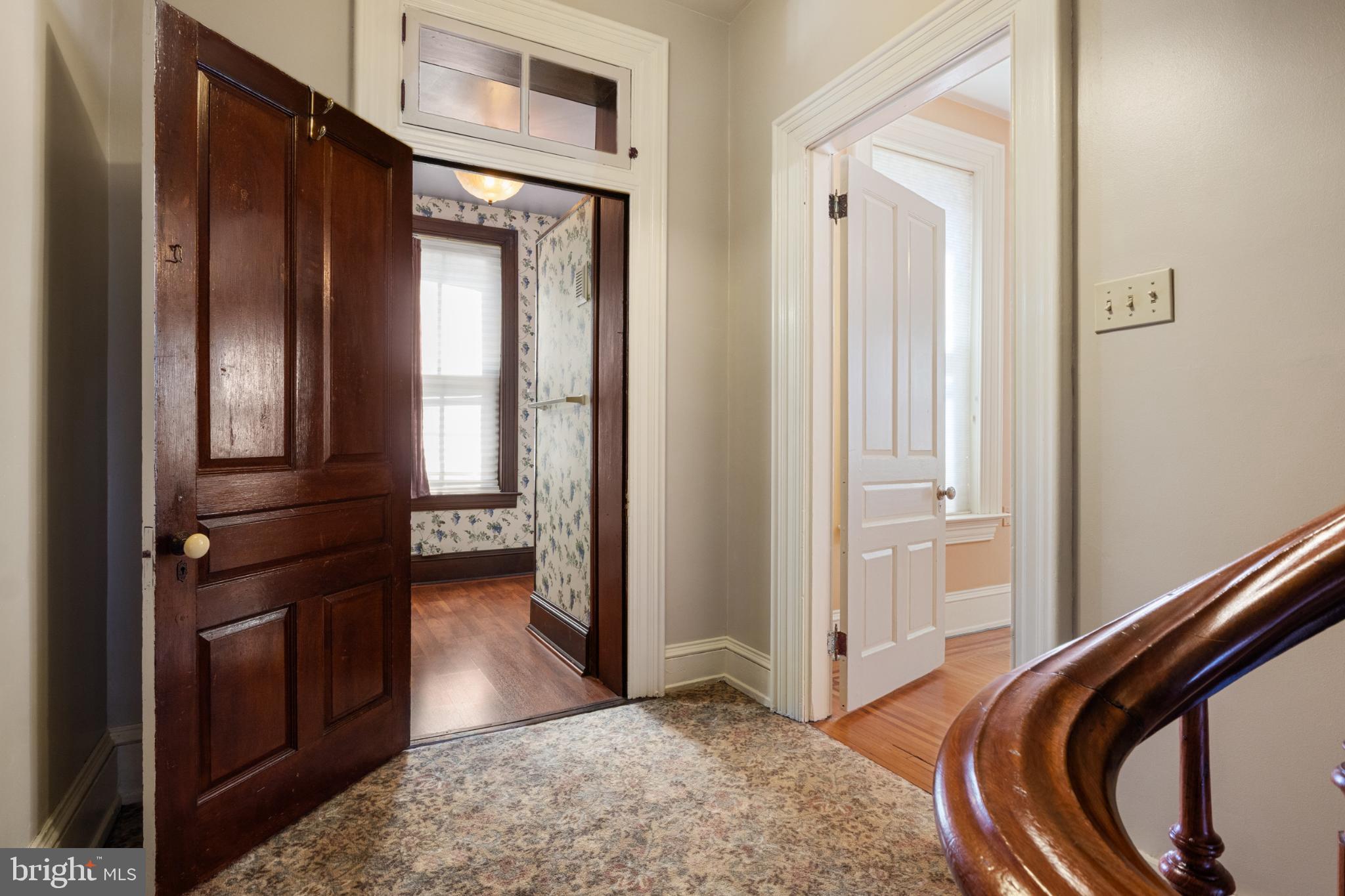 721 South George Street York, PA 17401 - Photo 31 of 78 a view of a hallway with wooden floor and staircase