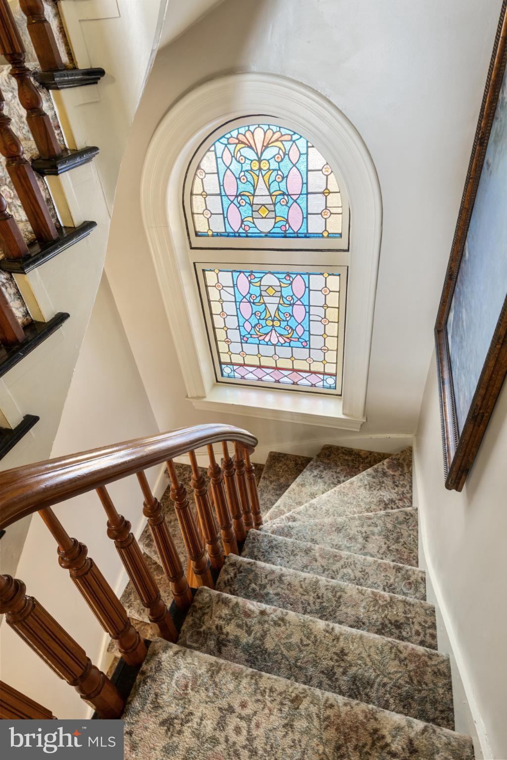 721 South George Street York, PA 17401 - Photo 52 of 78 Stunning stained glass illuminates the staircase.
