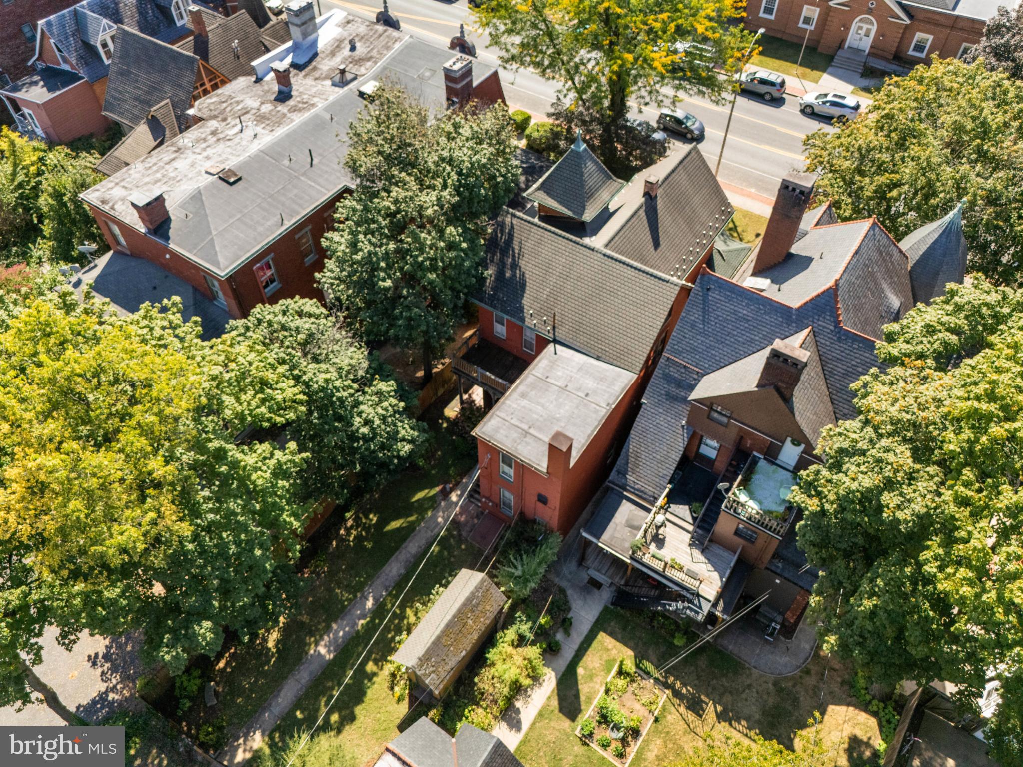 721 South George Street York, PA 17401 - Photo 63 of 78 an aerial view of a house with swimming pool and garden view