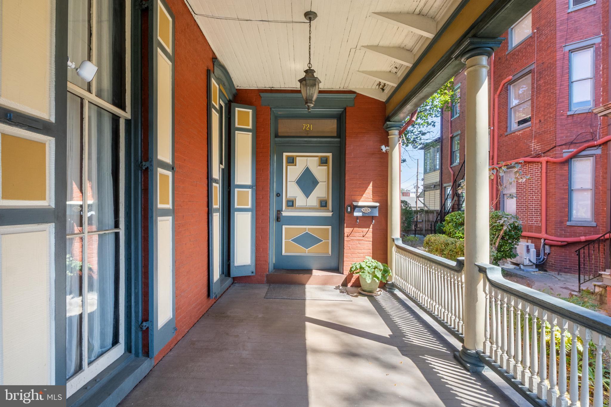721 South George Street York, PA 17401 - Photo 9 of 78 Charming porch with vibrant architectural details.