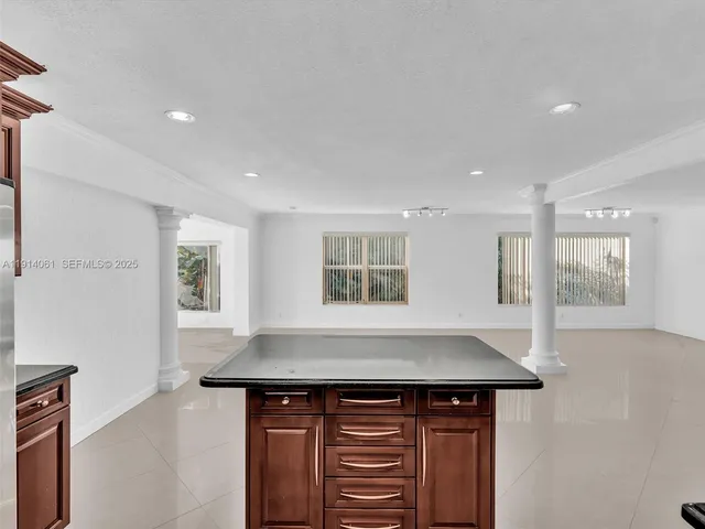 a view of a living room and a window