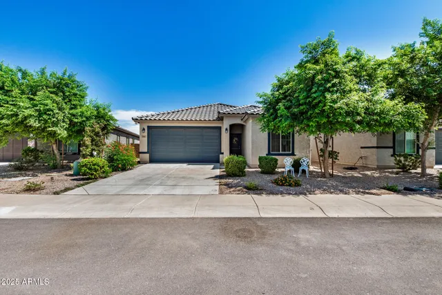 front view of a house with a small yard