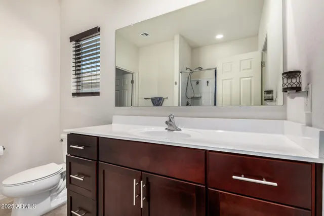 a bathroom with a sink and a toilet