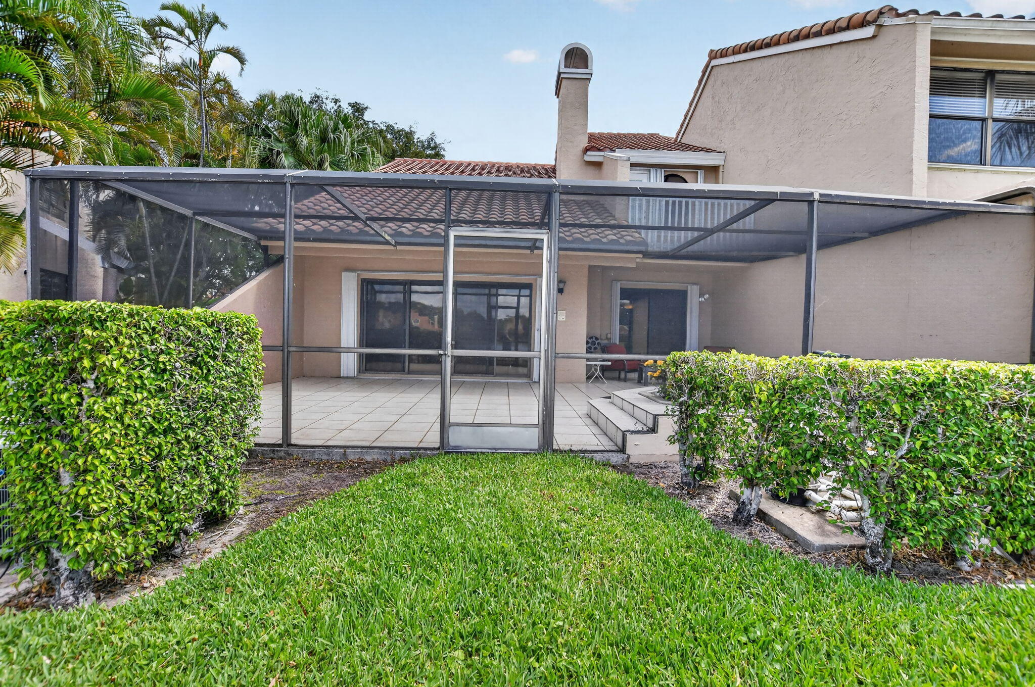 22582 Meridiana Drive Boca Raton, FL 33433 - Photo 44 of 60 screened in patio