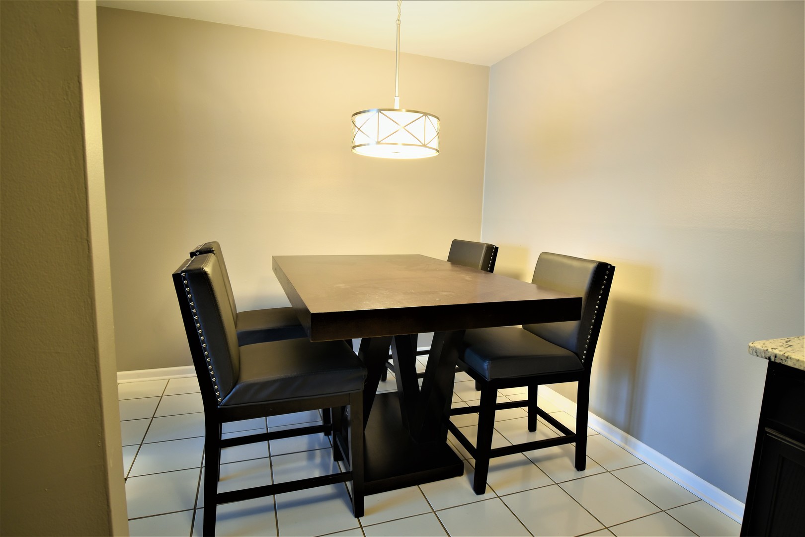 19330 Wolf Road, Unit 5 Mokena, IL 60448 - Photo 11 of 25 a view of a dining room with furniture and window
