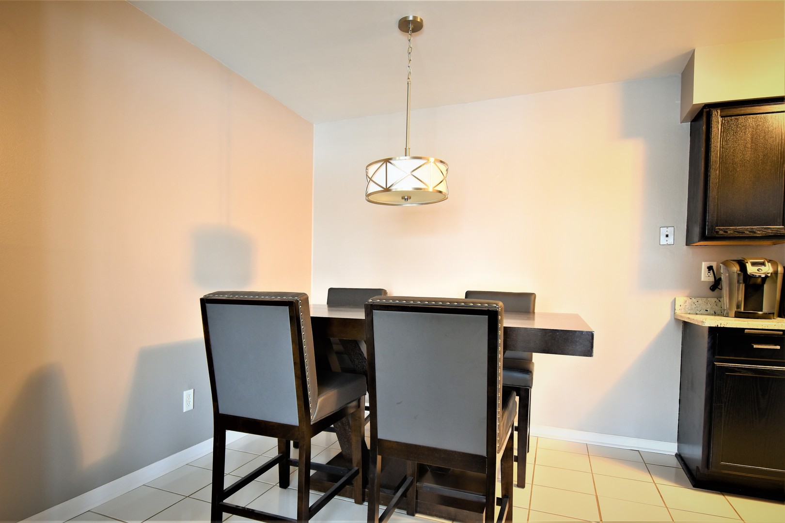 19330 Wolf Road, Unit 5 Mokena, IL 60448 - Photo 12 of 25 a dining room with furniture and window
