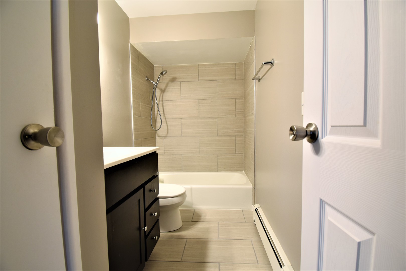 19330 Wolf Road, Unit 5 Mokena, IL 60448 - Photo 22 of 25 a bathroom with a shower and a toilet