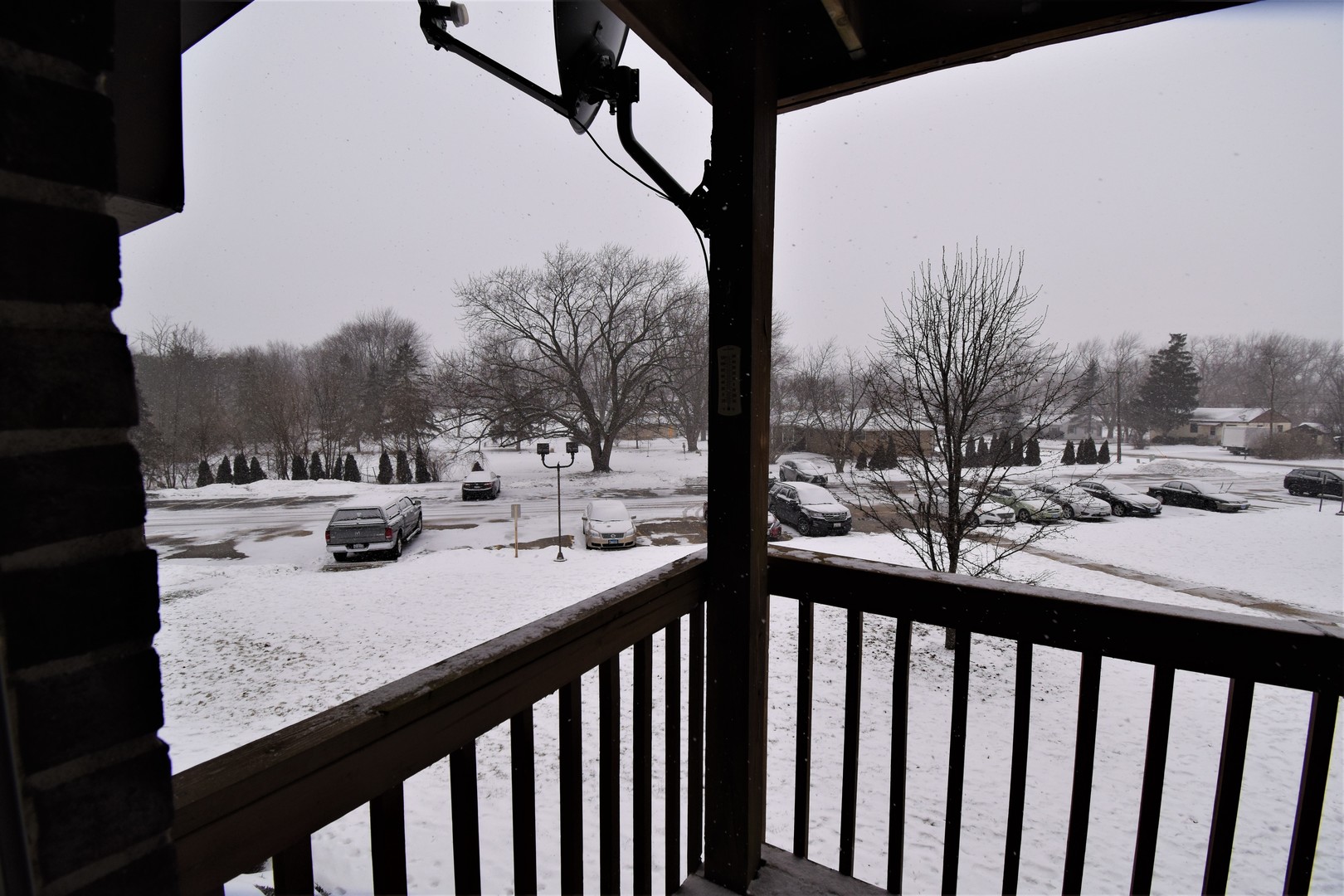 19330 Wolf Road, Unit 5 Mokena, IL 60448 - Photo 25 of 25 a view of a balcony with trees and cars