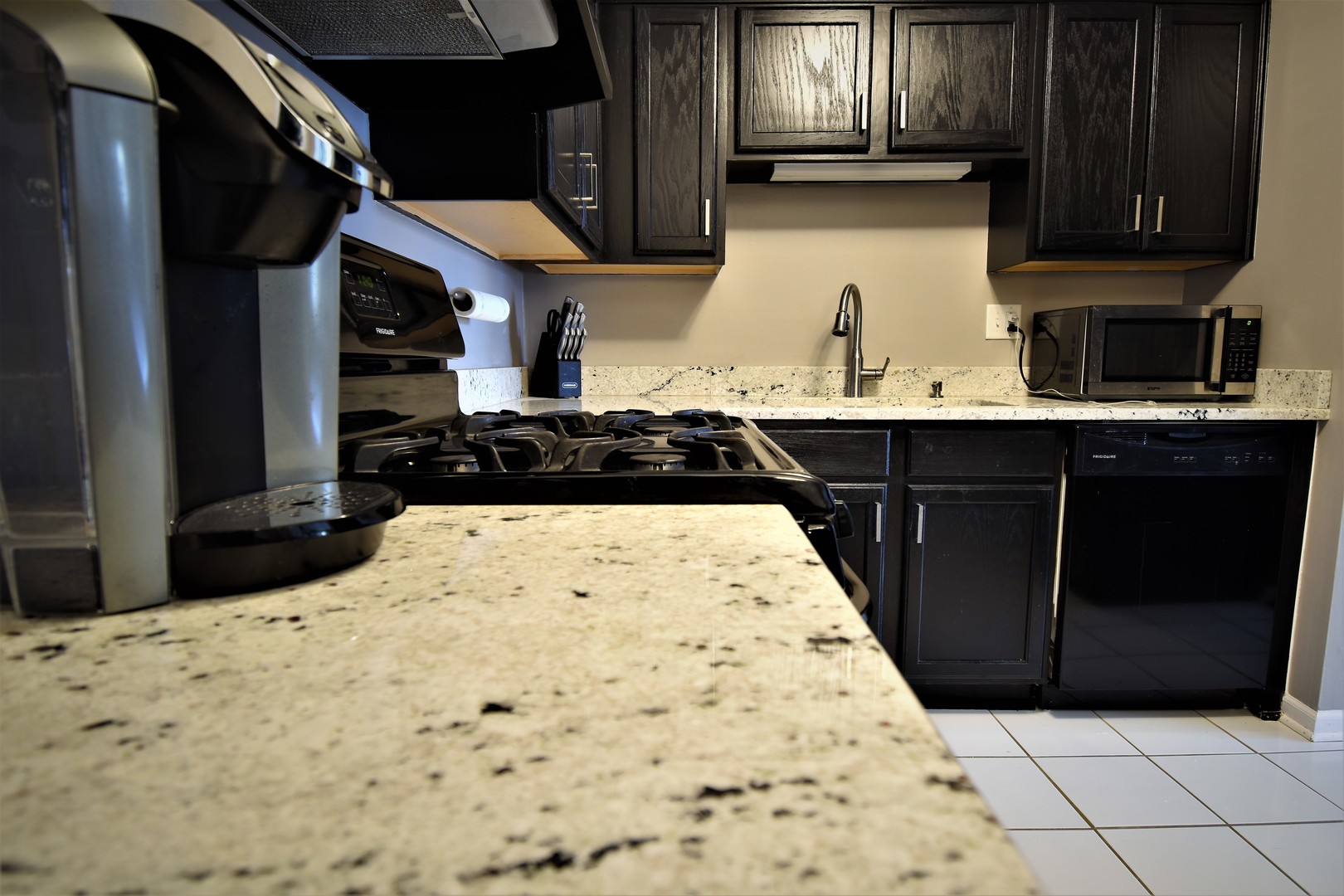 19330 Wolf Road, Unit 5 Mokena, IL 60448 - Photo 8 of 25 a kitchen with a sink and cabinets